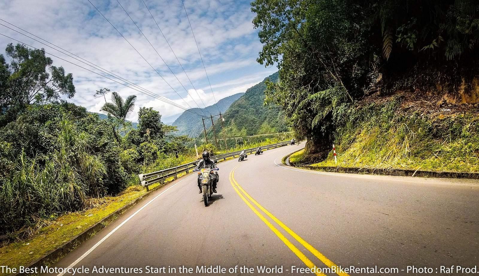 Group Motorcycle tour on paved road in Ecuador