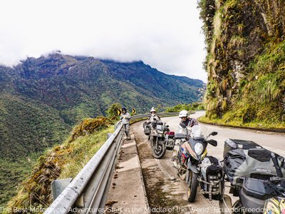 three adventure motorcycles on the road through the sangay national park