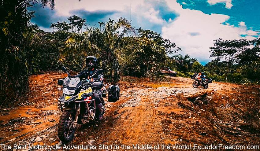 a bmw f750gs and a honda africa twin on a dirt road in Ecuador doing a dual sport motorcycle tour