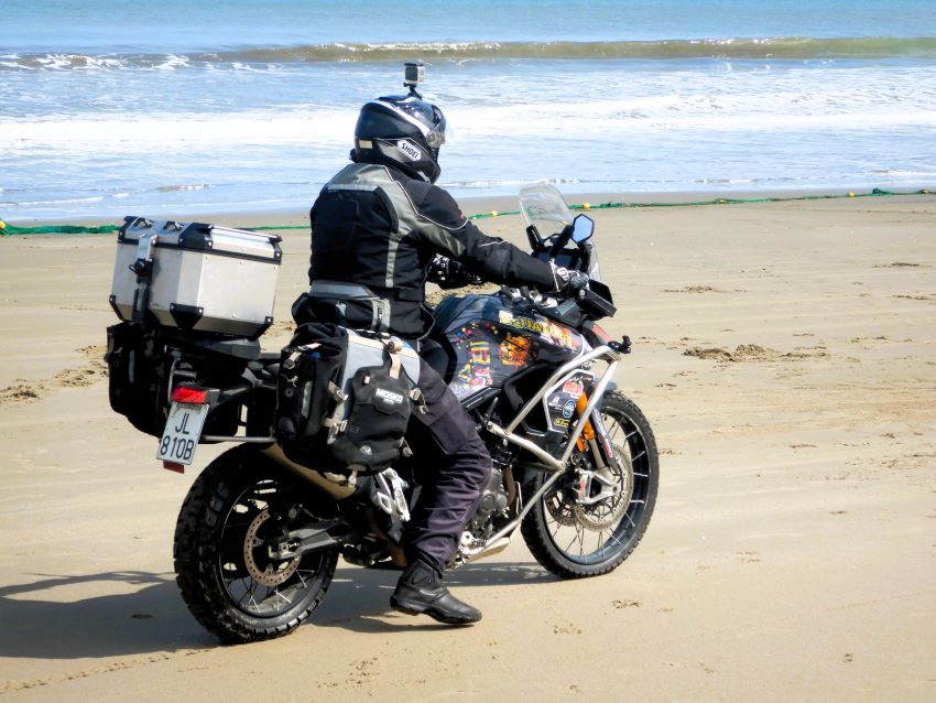 triumph tiger 900 rally with crashbars on beach in ecuador 850px