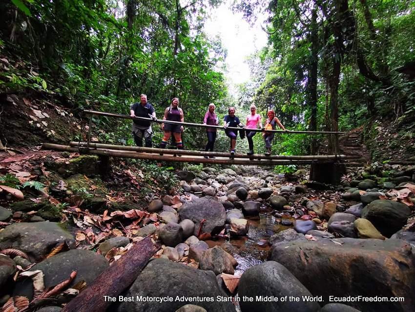 womens motorcycle tour hiking to waterfall