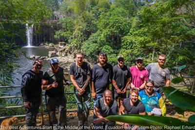 ecuador motorcycle group tour photograph with salto de tigre waterfall in the background