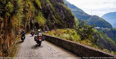 the cobbled road from banos to the amazon jungle with adventure motorcycles in ecuador