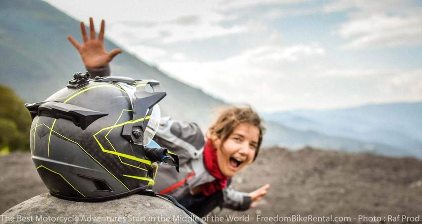 Happy woman motorcyclist on Ecuador Freedom Motorcycle Adventure