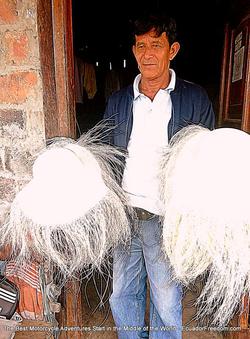 Panama Hat Weaver in Pile Ecuador