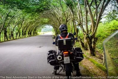 adventure motorcycle on coastal road in ecuador