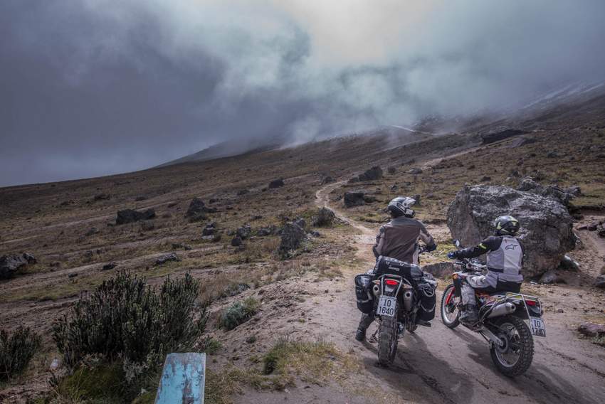 two dirt bikers riding up to 15000 feet on the guagua pichincha volcano in Ecuador