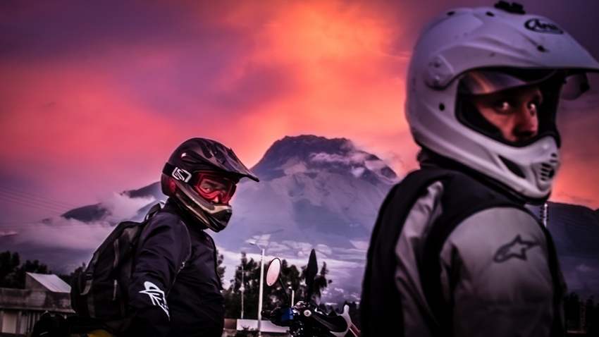 two dirt bike riders on a motorcycle tour in otavalo ecuador