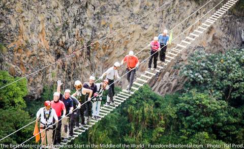 tibetan bridge excercise group on motorcycle tour in ecuador