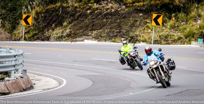 two adventure riders on a curvy mountain road on a motorcycle tour in Ecuador