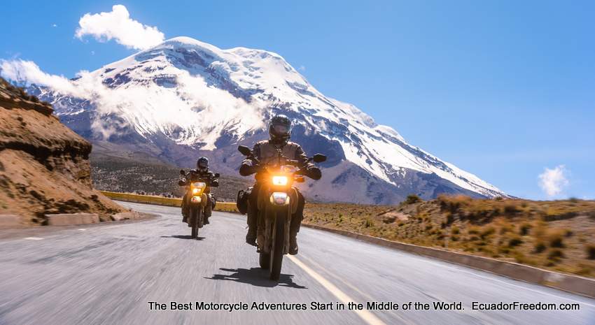 two motorcycles on a motorcycle tour with volcano in background